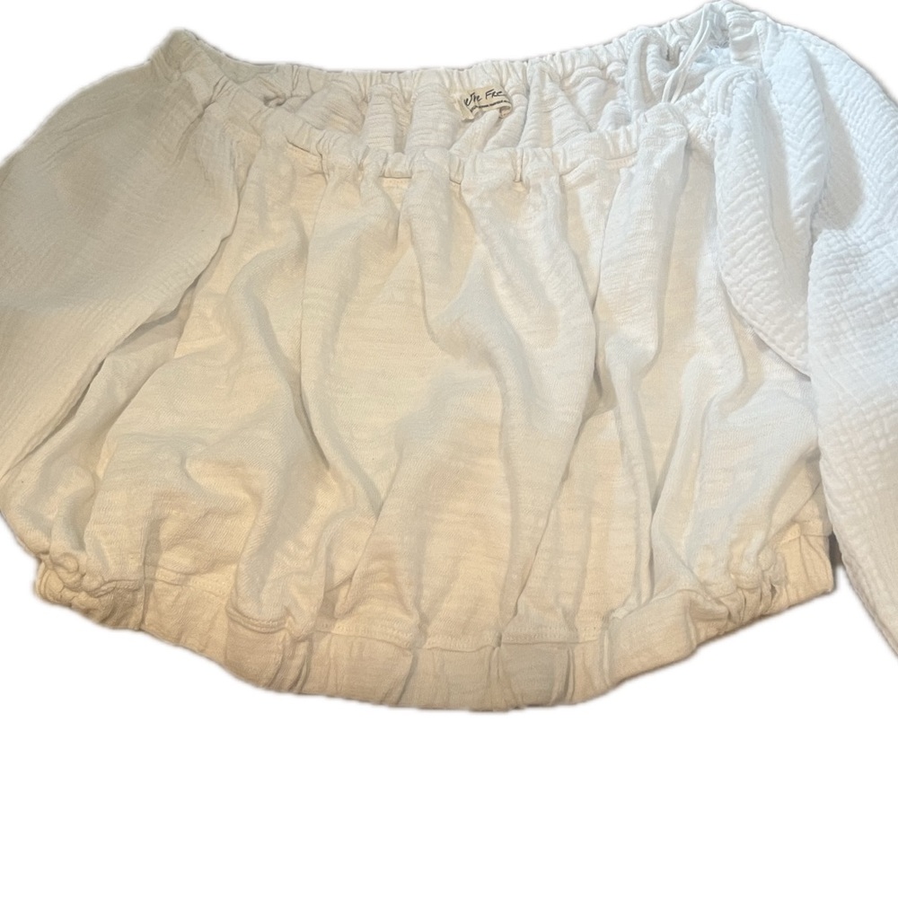 Free people off the shoulder long sleeve white crop top. Size medium.